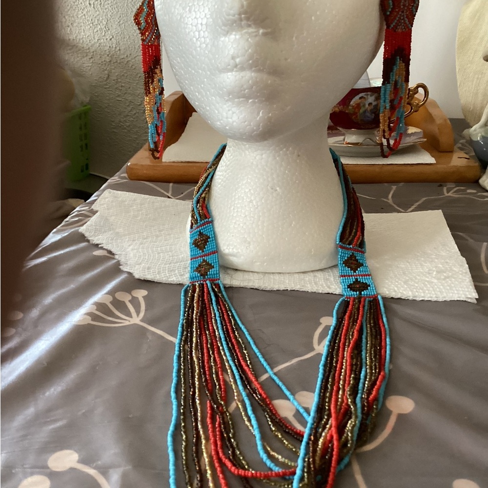 Beaded earring and necklace set . Very pretty .